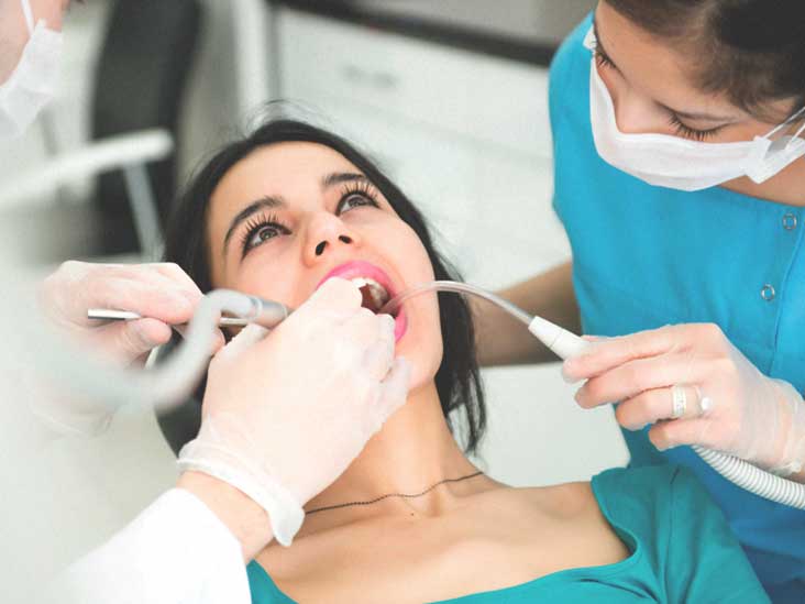 Dark-haired Woman at Dentist