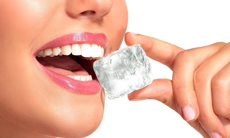 Model Woman with Ice Cube on Mouth